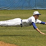 jayking79.jpg Jay King makes a diving stop for the Trojans. Photo by Steve Gulledge