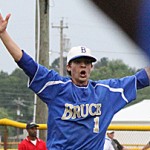 hatley73 Jay King celebrates after striking out the last batter as his teammates rush to him to celebrate the North Half Title. Photo by JM