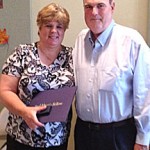Amanda Goodson accepted the honor for her husband Perry from Mayor J.R. Denton.