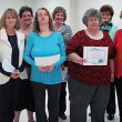 Tri Community Club Perfect Attendance awards went to, from left, Teresa Patterson, Tink Massey, Stephanie Hitt, Katie Gaskin, Laura Baker, Rose Diamond, Martha Cannon, Millie Goforth and Daphne Warren.
